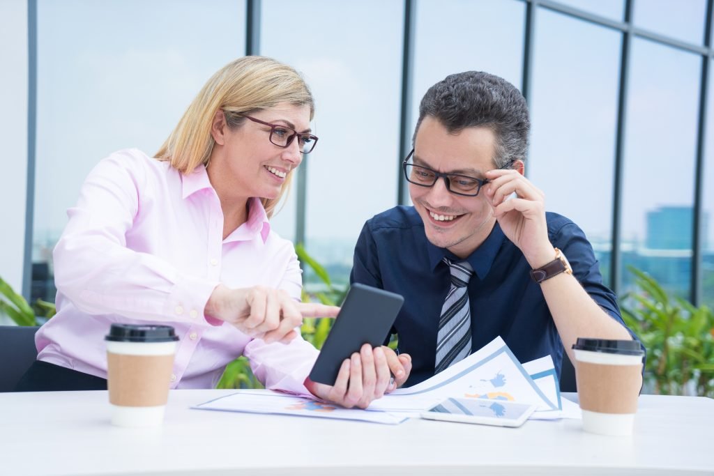 Small business owner managing accounts with online bookkeeping
